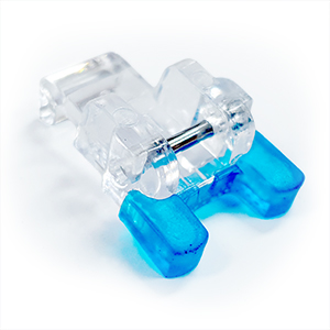 Closeup of the Janome Button Sewing Foot